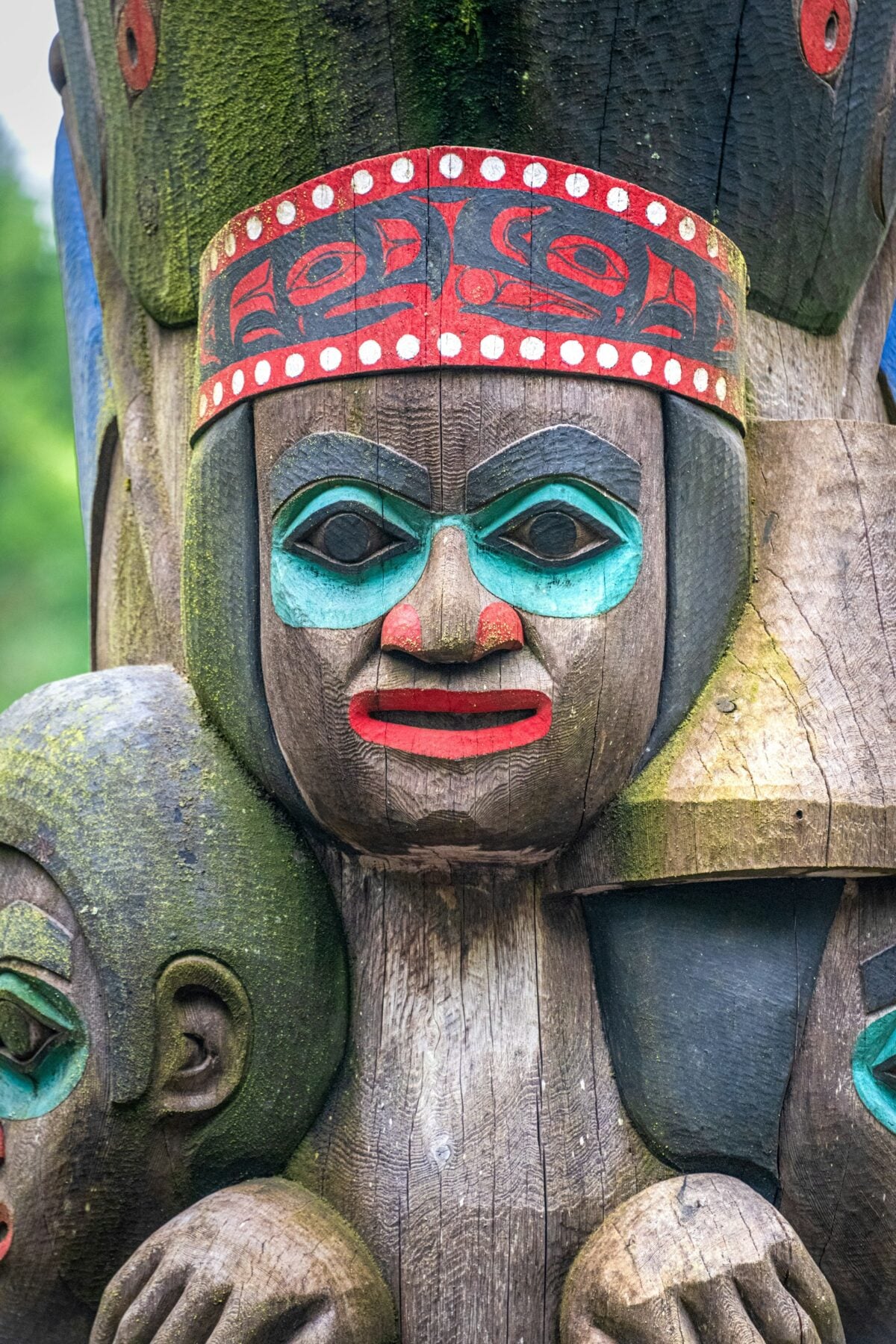 Colorful totem pole depicting Fog Woman at the Totem Heritage Center in Ketchikan, Alaska.